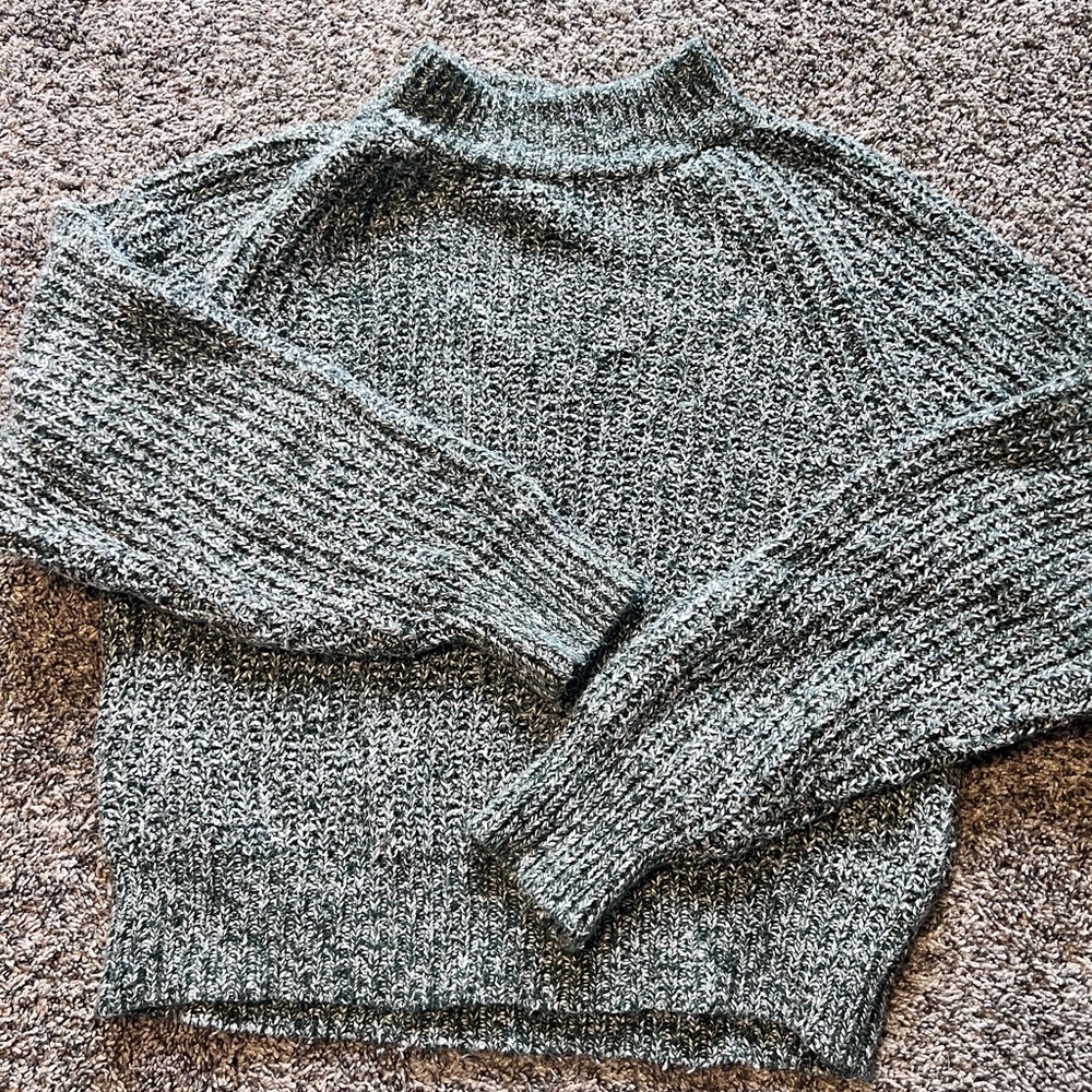 Green and white sweater